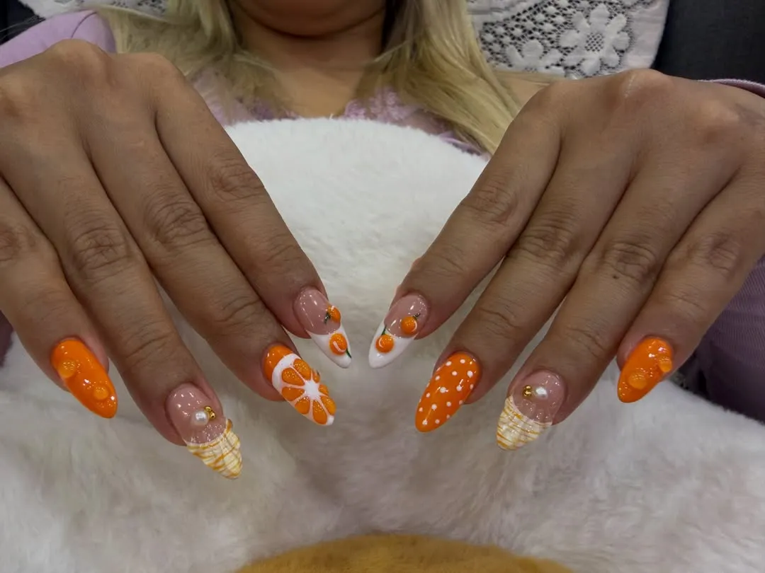 Orange Citrus-Inspired Textures with Polka Dots and Striped Tips