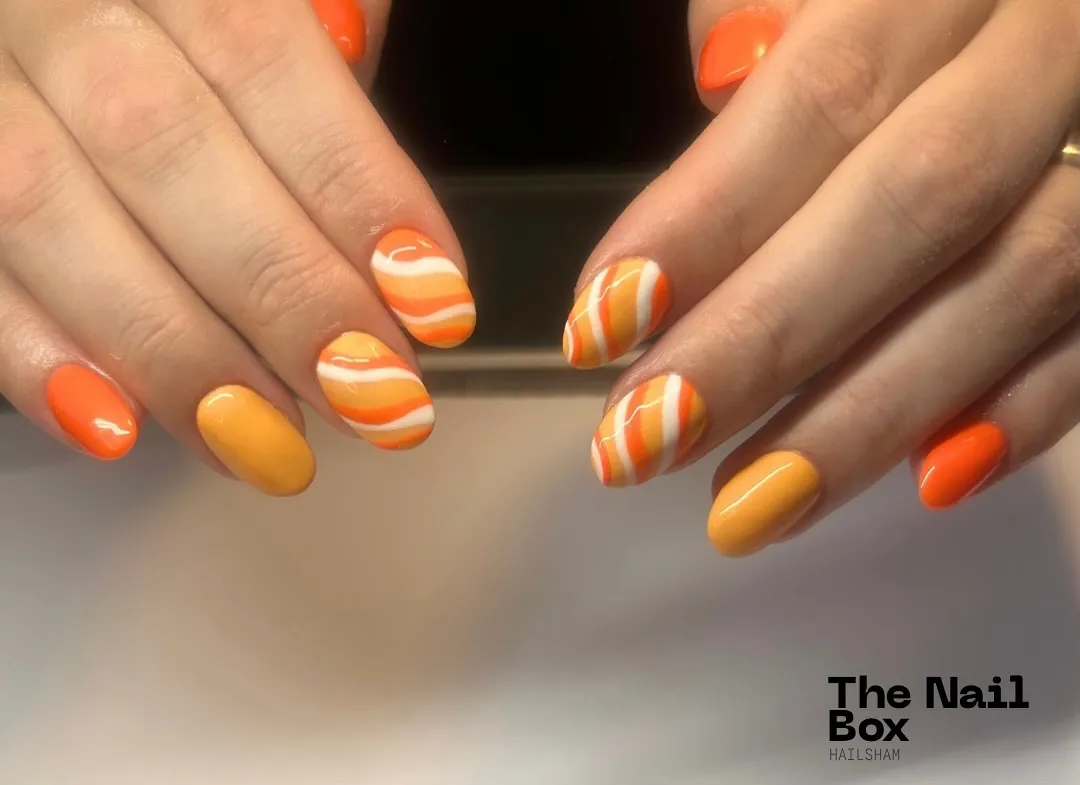 Orange and Yellow Nails with Wavy Orange-White Stripes