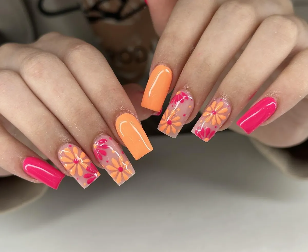Hot Pink and Peach Nails with Floral Accent Art