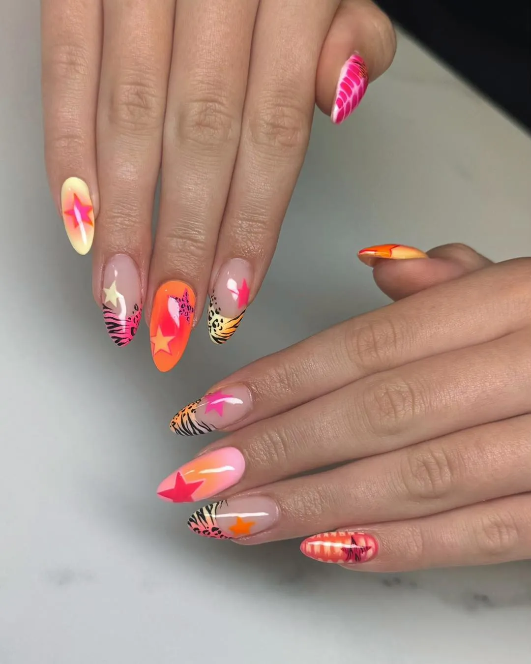 Neon orange-pink mix with stars and graphic prints
