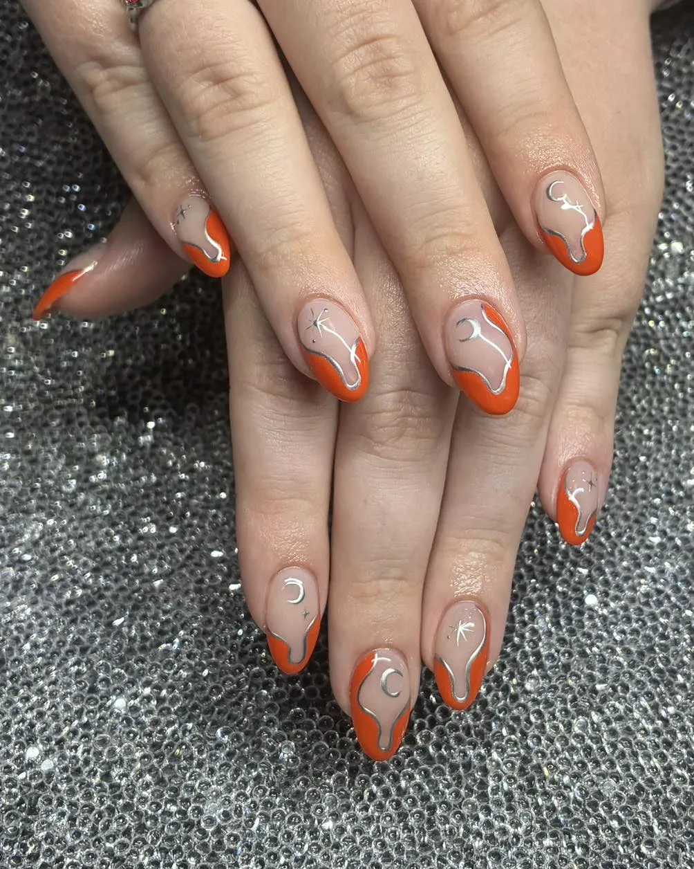 Orange French tips with abstract white line art