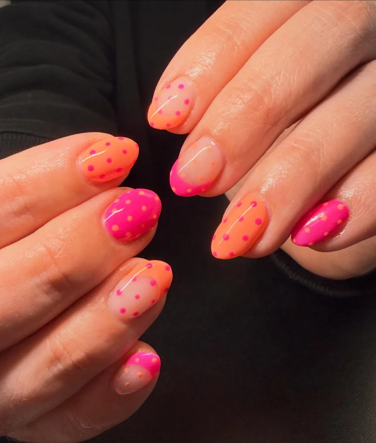 Orange and hot pink polka dots with bright contrast