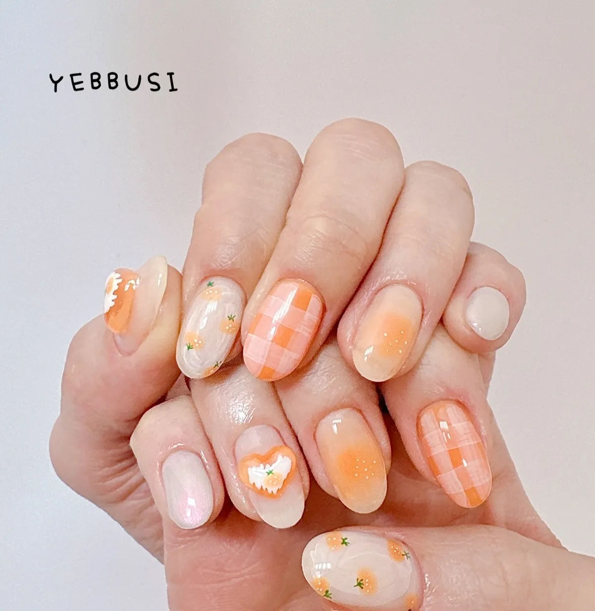 Mixed pastel orange set with plaid and tiny citrus-like accents