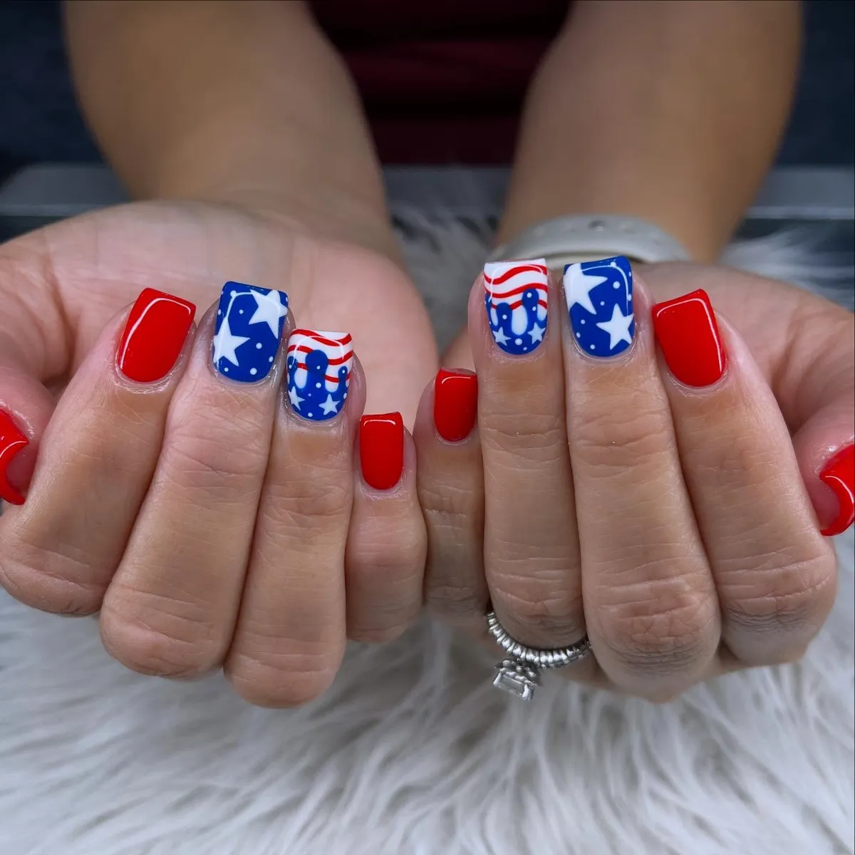 Short red solids with blue star-and-wave accents