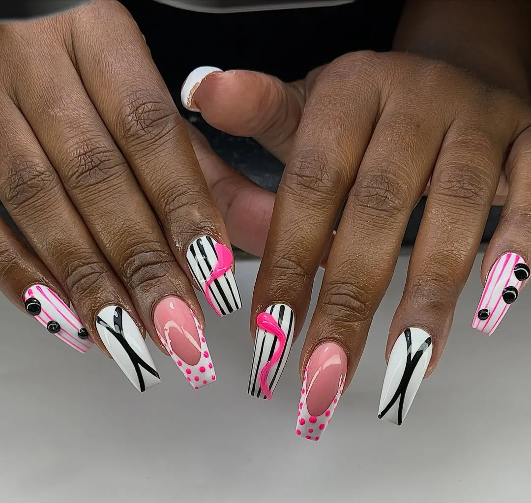 Striped Black-and-White Nails with Hot-Pink Swirls and Dot Accents