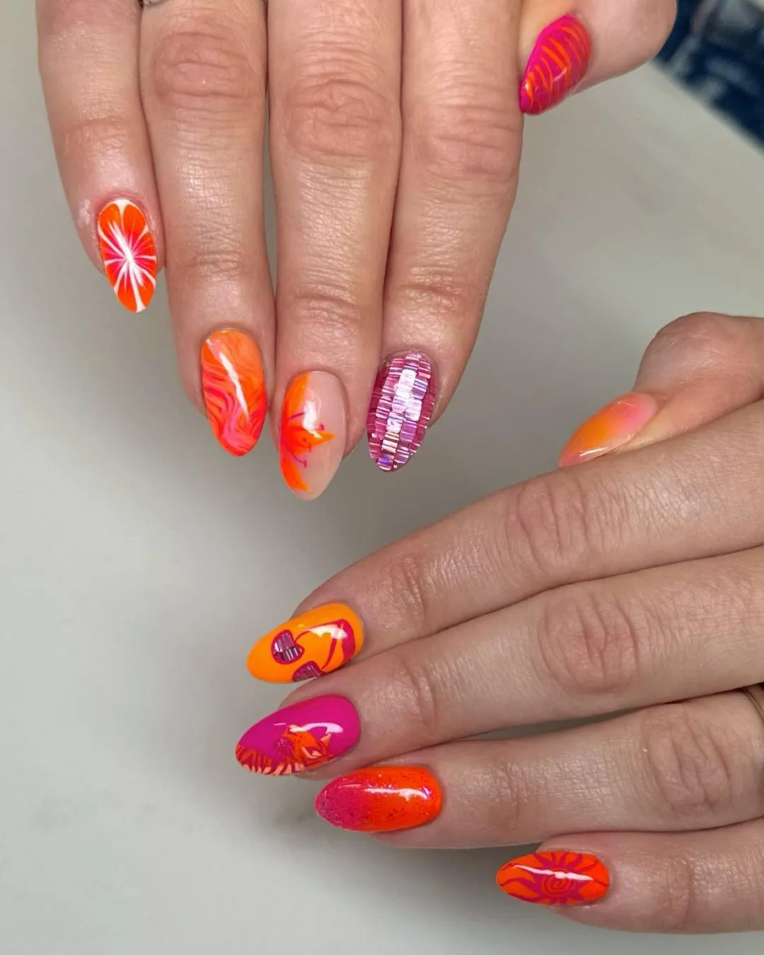 Orange-pink graphic mix with reflective tile accent