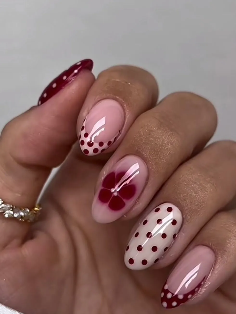 Red-and-pink polka dots with a floral accent