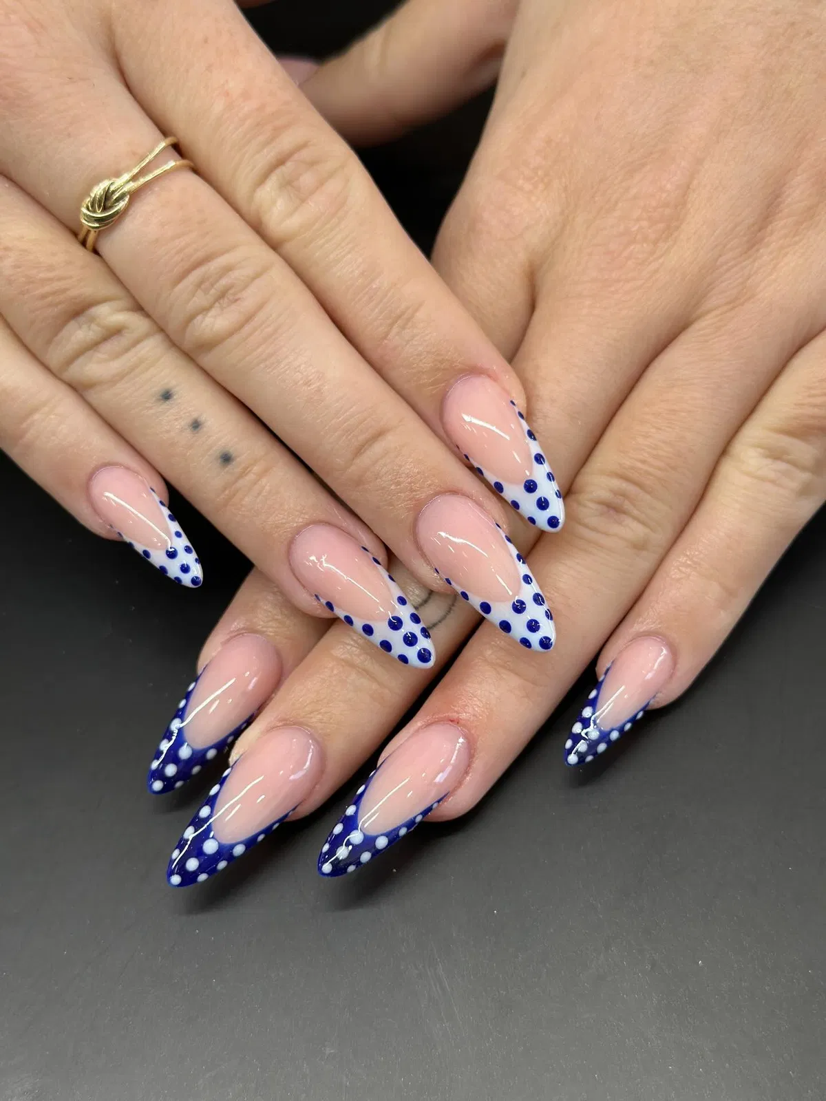 Blue polka-dot French tips with alternating deep-blue dotted tips