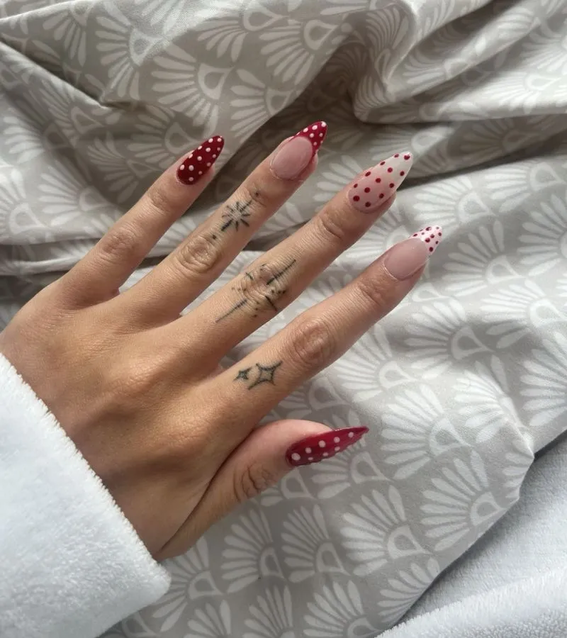 Red-and-white polka dot mix with nude base accents
