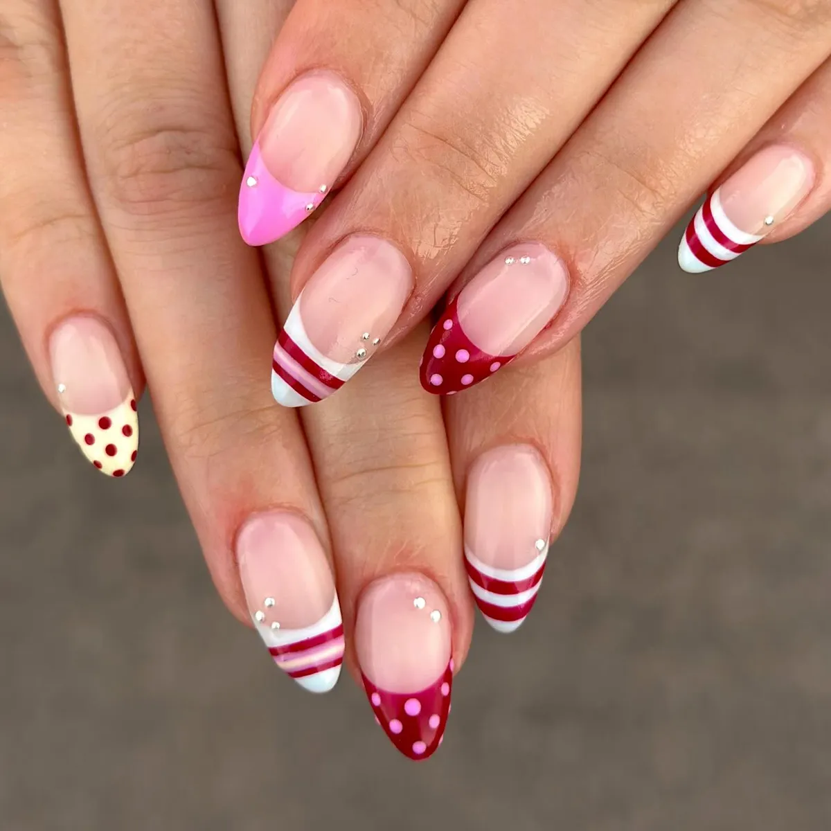Nude Base with Striped Tips and Polka Dot Accents