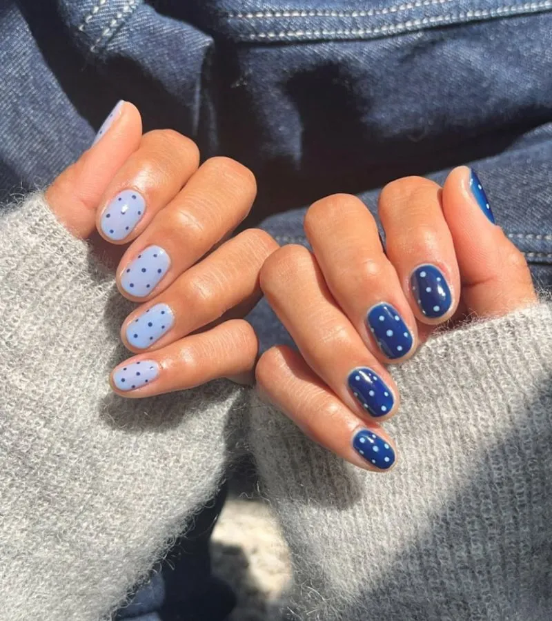Two-tone blue polka dot manicure (light and deep blue)