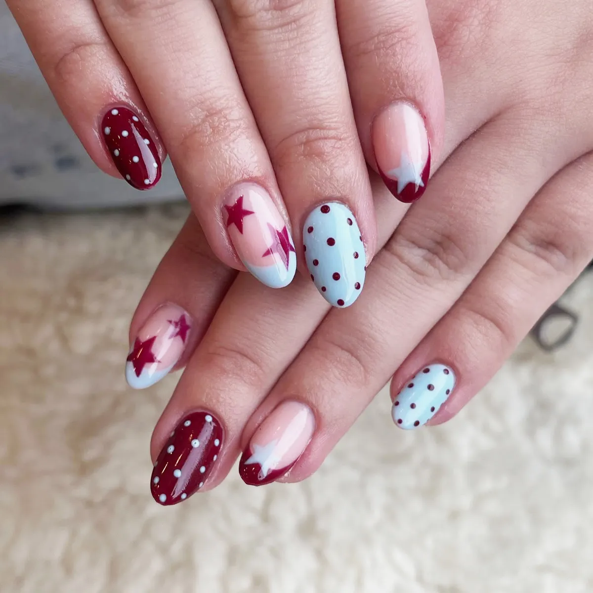 Red, light-blue, and star accents with polka dots