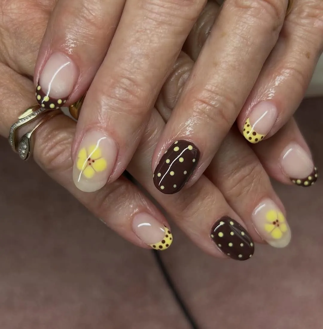 Brown tips with pale-yellow polka dots and flower accents