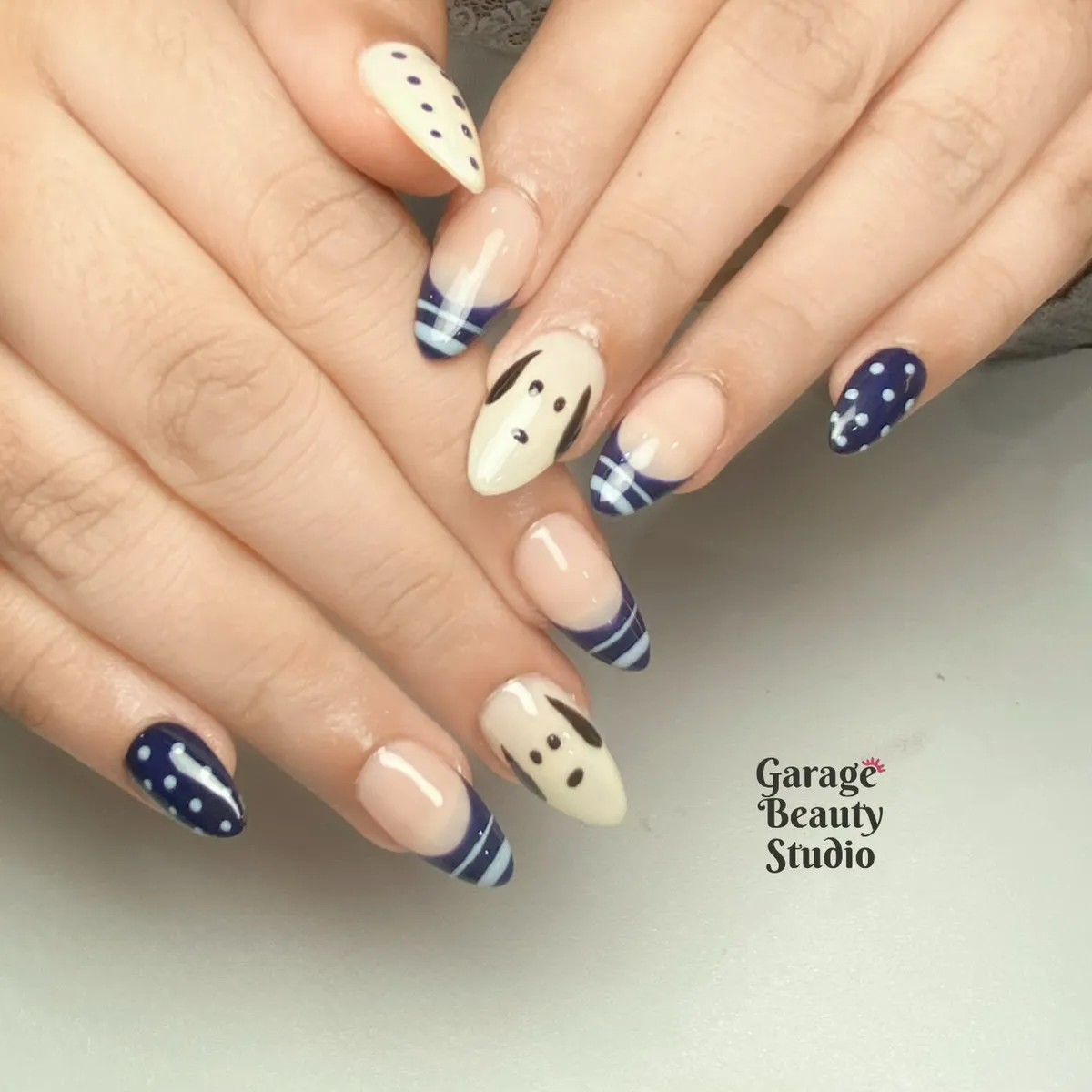 Navy tips, polka dots, and graphic ear accents