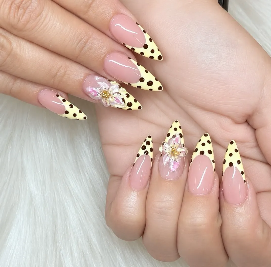 Yellow polka-dot tips with 3D floral accents