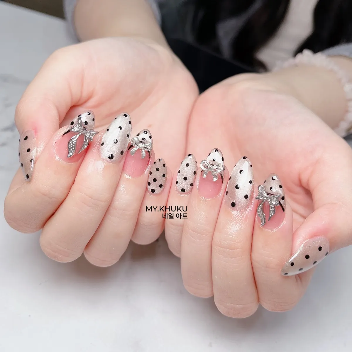 Sheer polka dots with silver bow embellishments