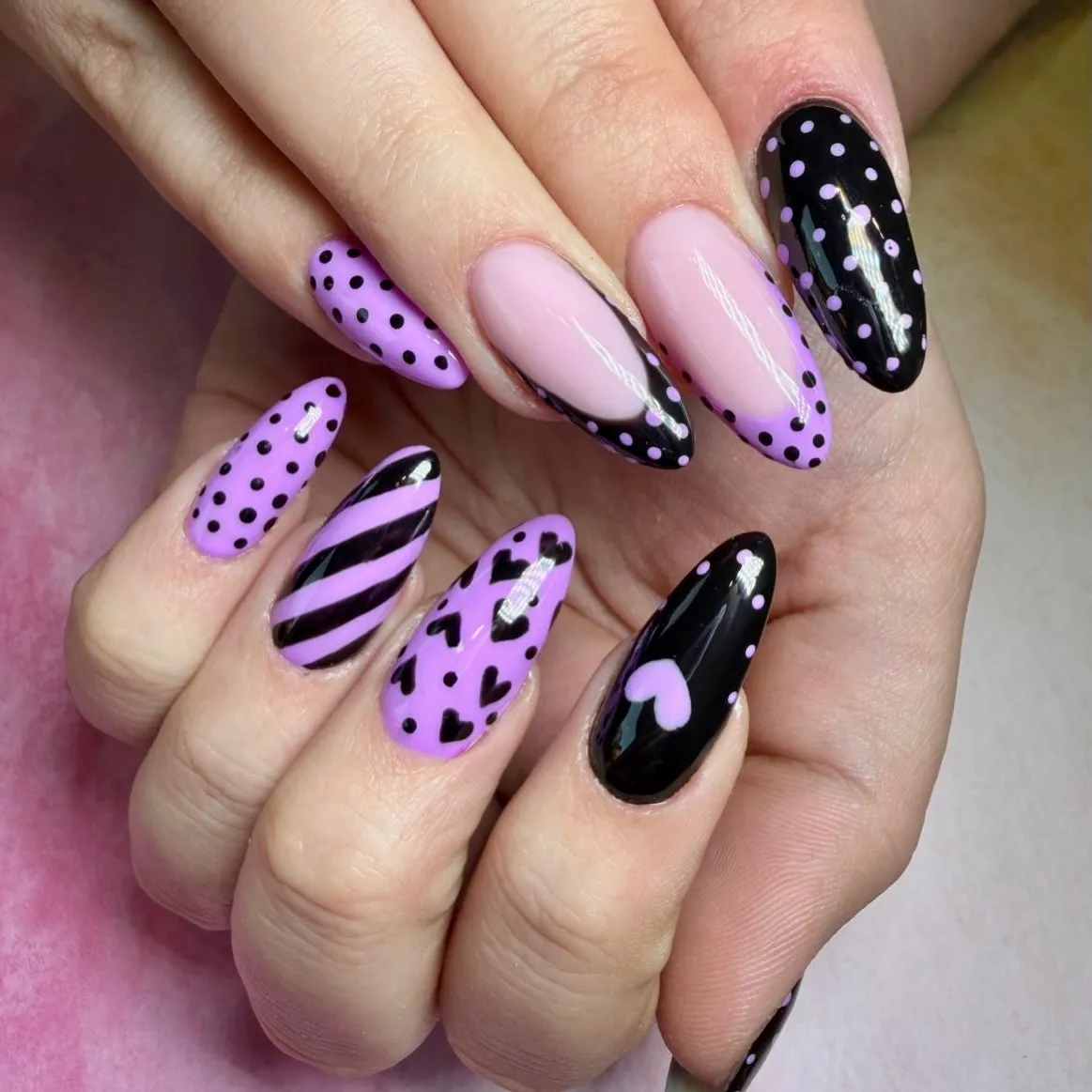 Black and purple polka dots with stripes and heart motifs