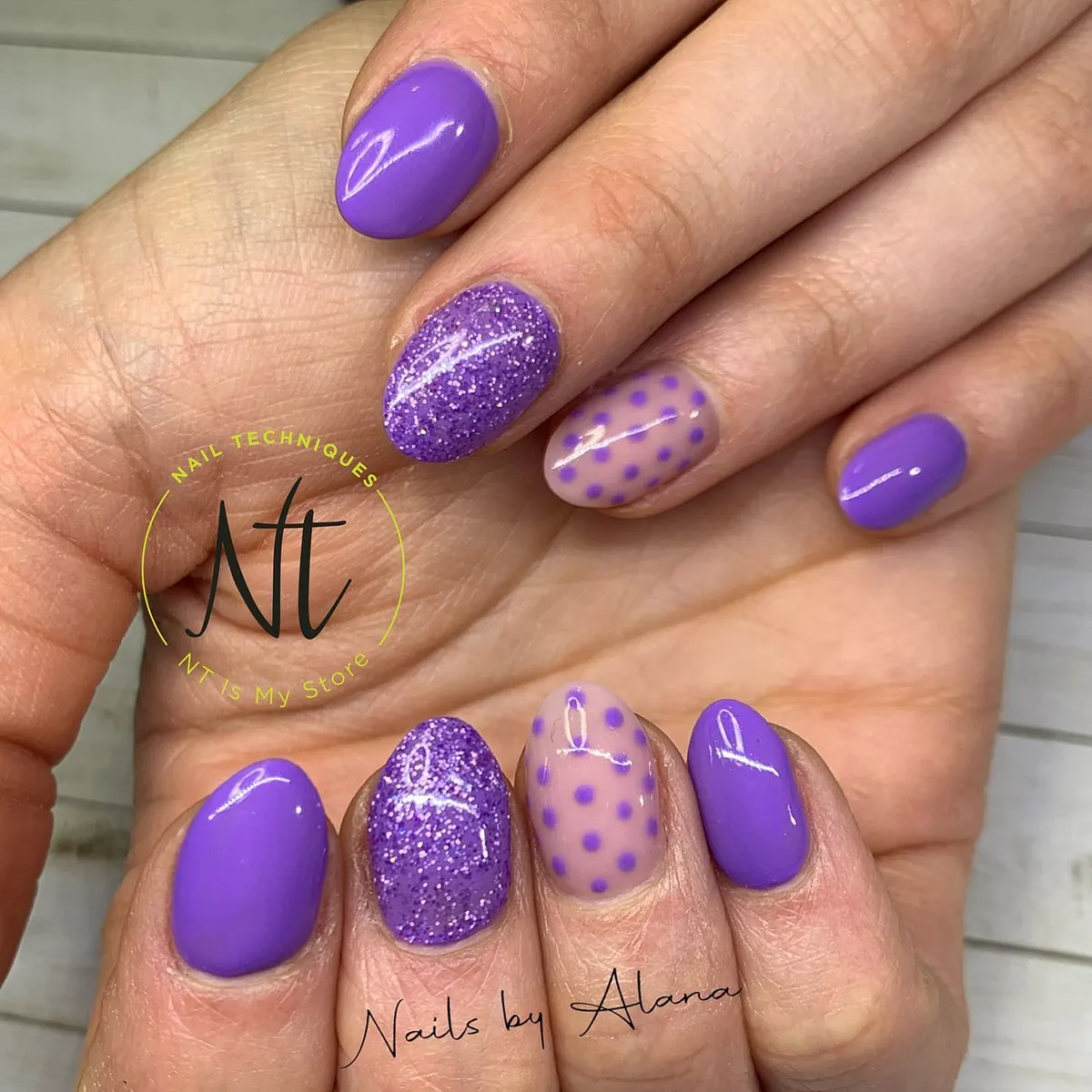 Bright purple set with nude polka-dot accents and glitter nails