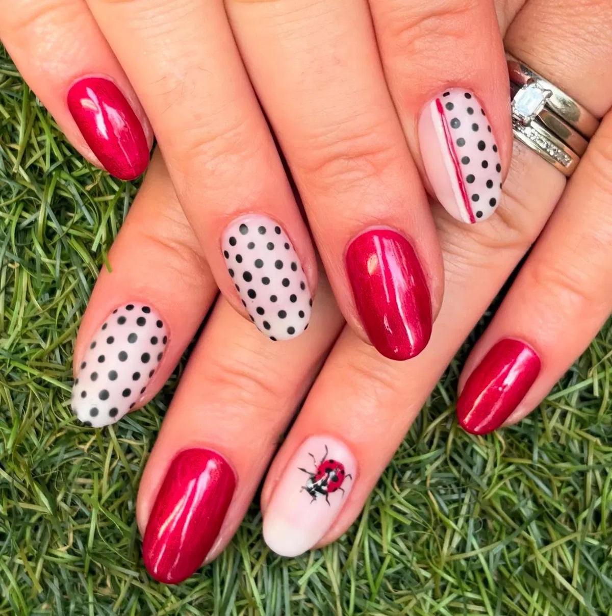 Deep pink-red solids with black polka dots and ladybug accent
