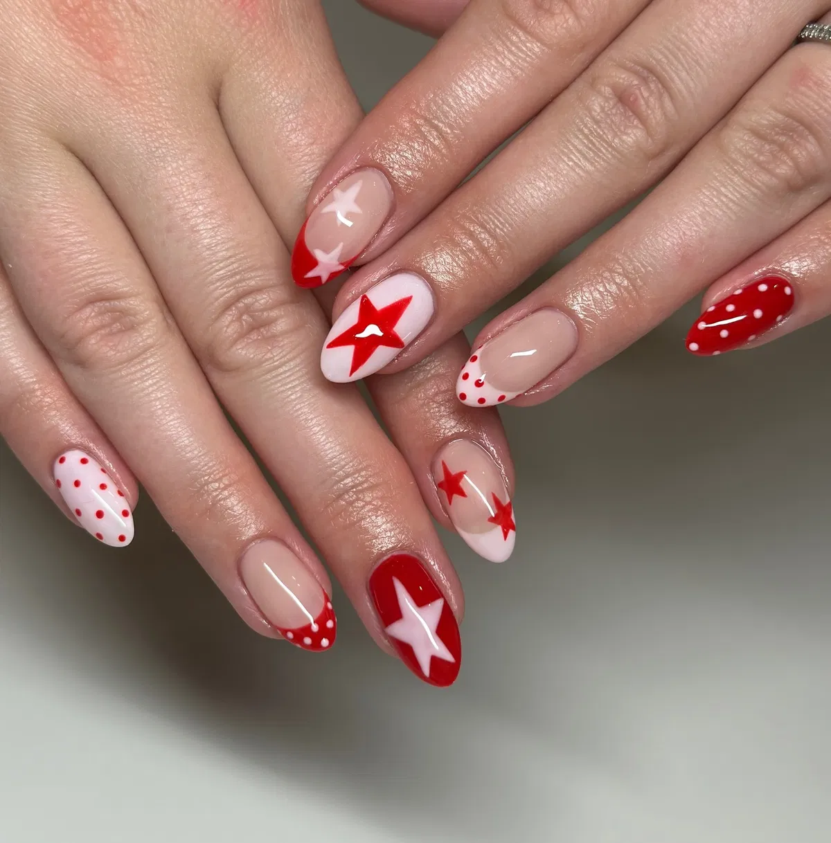 Red tips with stars and polka-dot accents