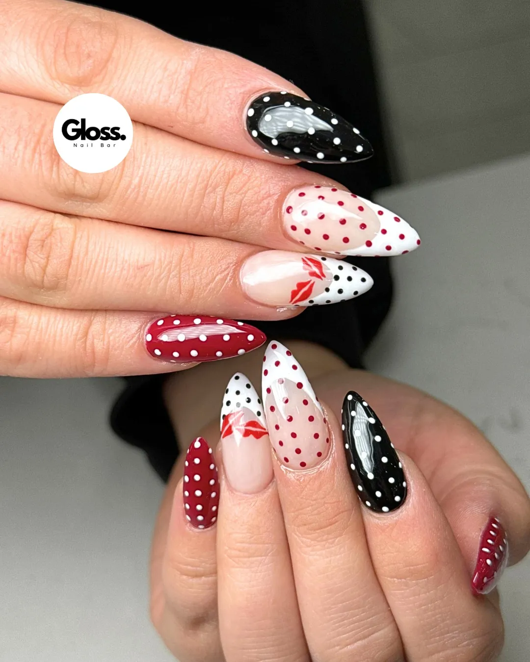 Mixed black, red, and white polka-dot set with lip-print accent