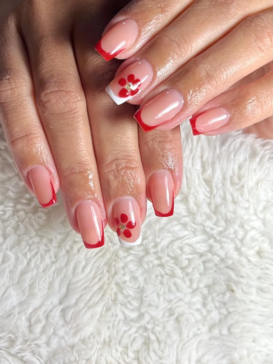 Red French Tips with Floral Accent Nails