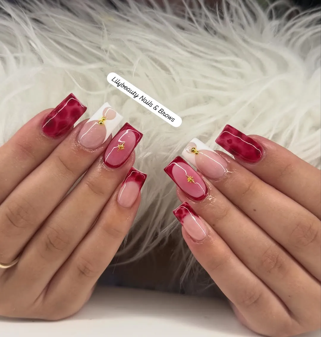 Marbled red tips with gold-toned star accents