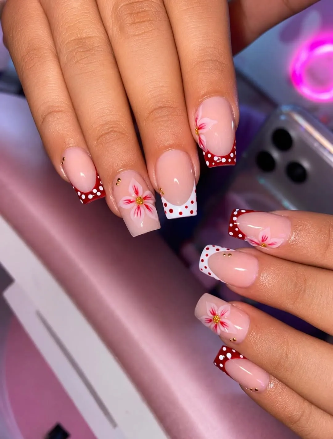 Polka-dot French tips with floral accents