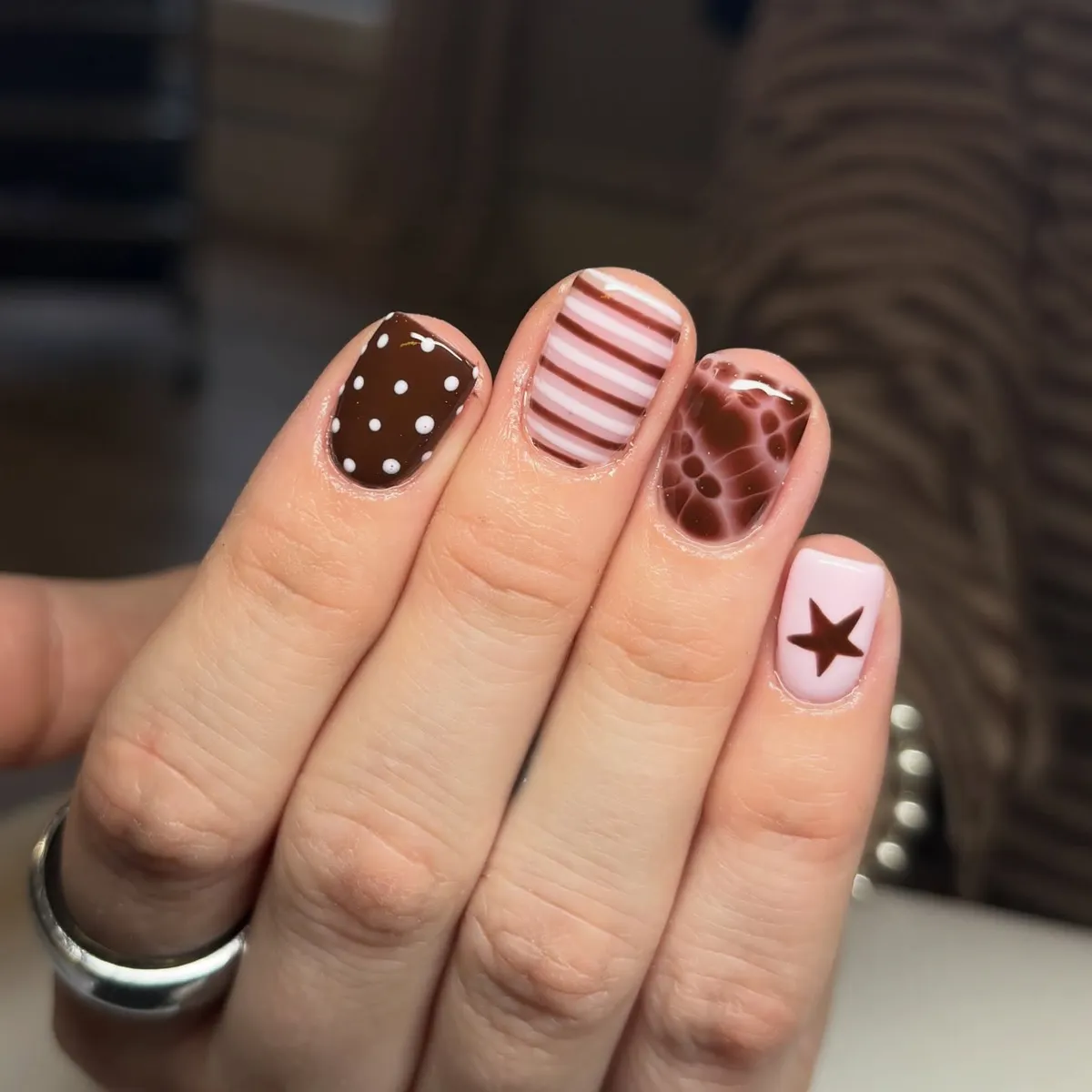 Chocolate polka dots with stripes, marbling, and star accent