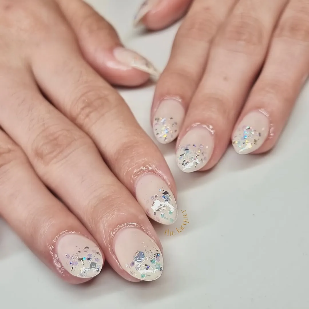 Nude-beige with holographic confetti tips