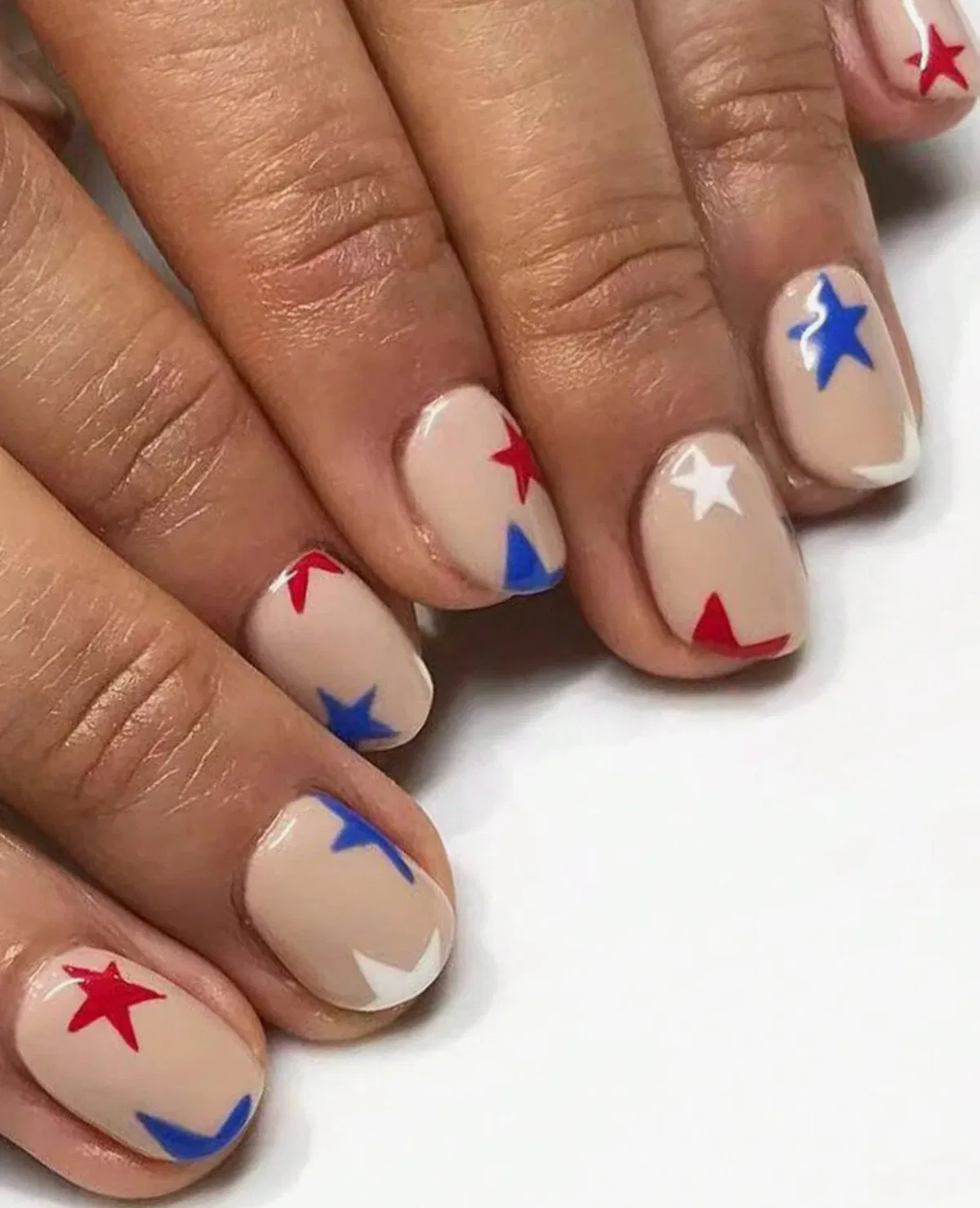 Minimal nude base with corner star accents