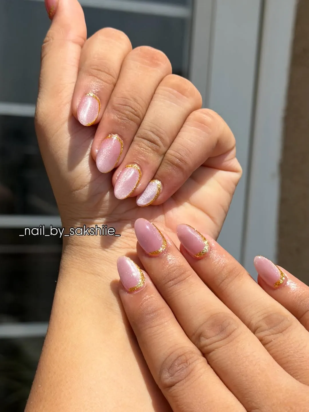 Pale pink shimmer with gold outline edging
