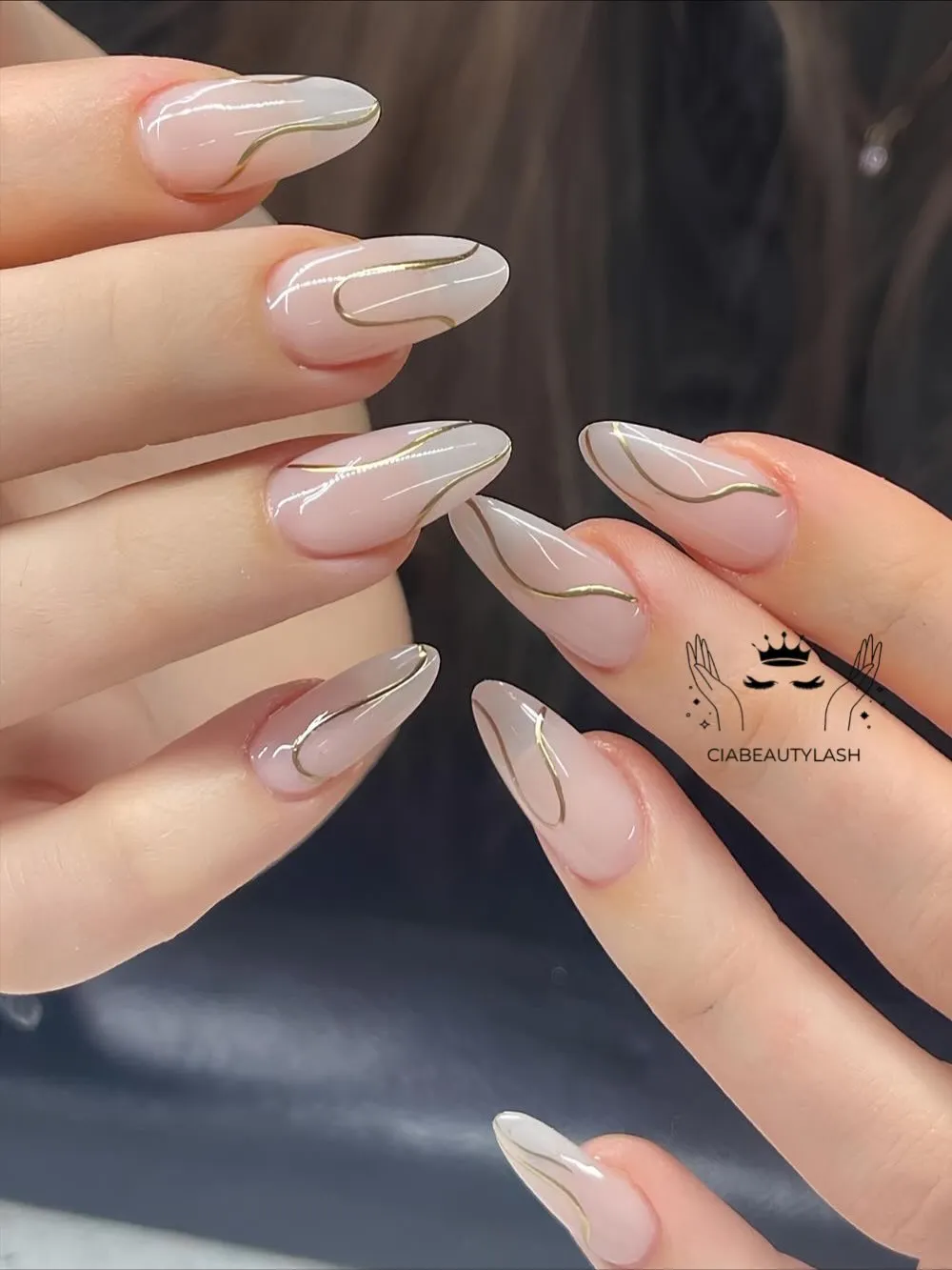 Sheer nude with metallic gold wavy lines