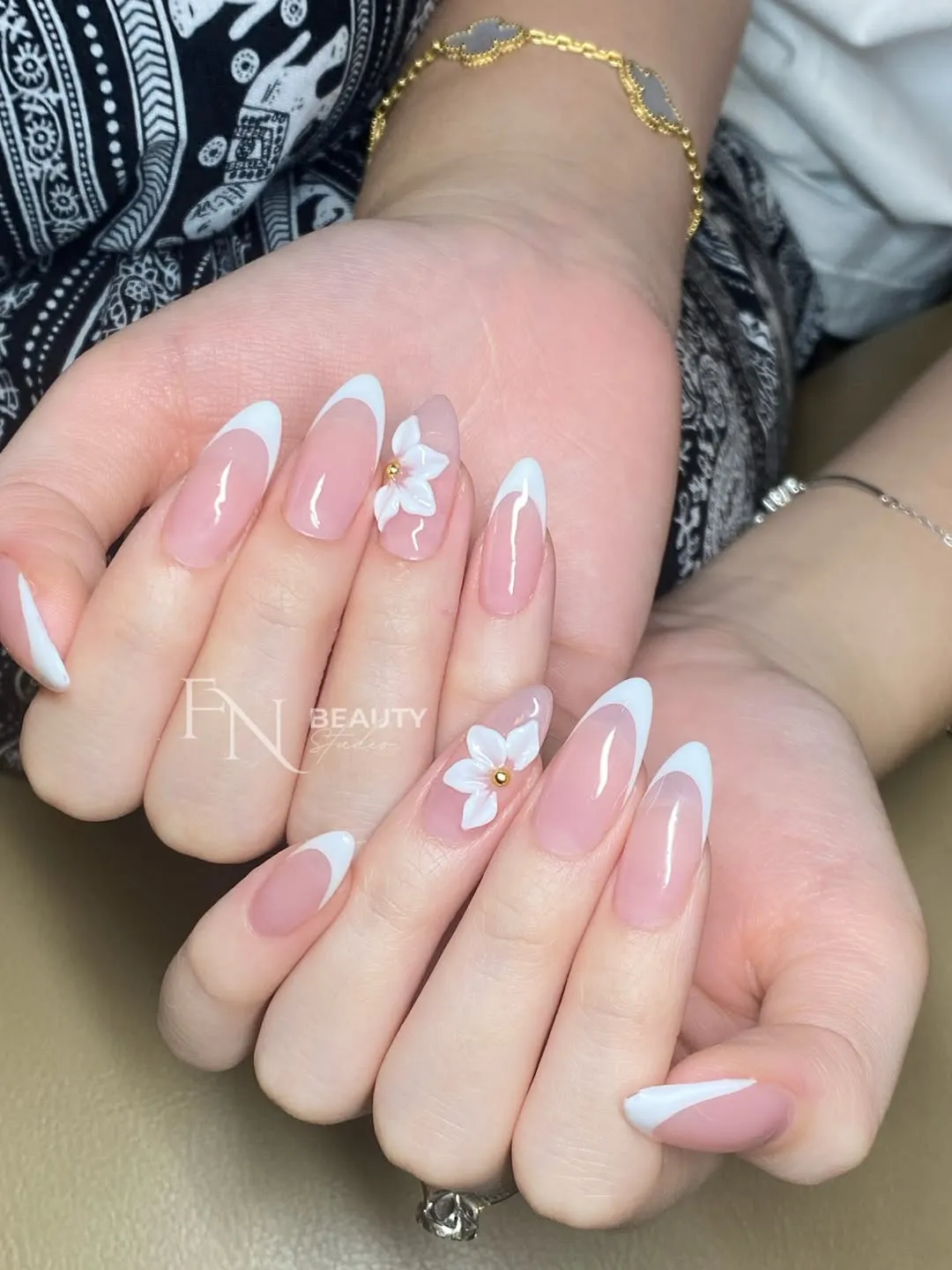 French tips with 3D white flower accents