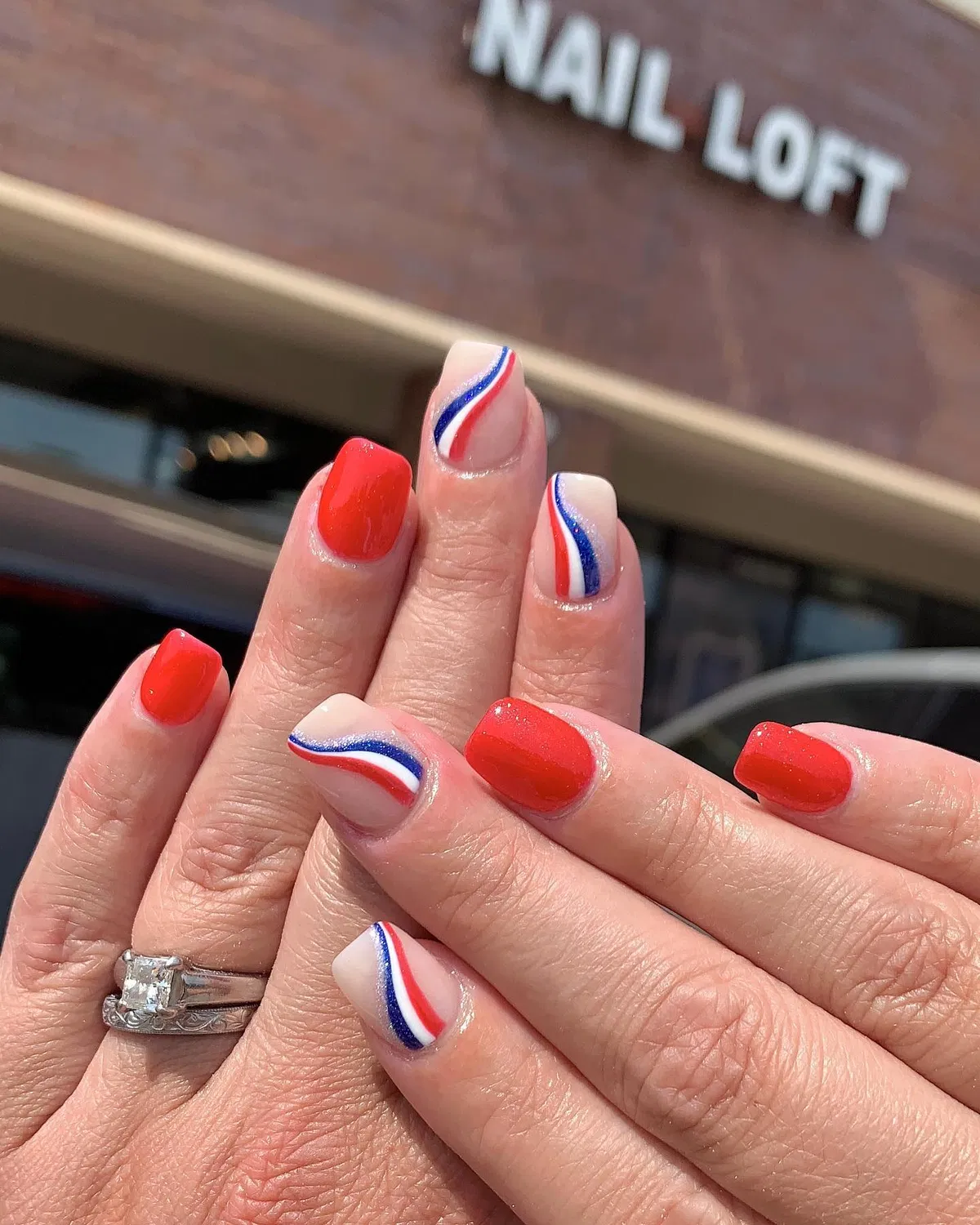 Red solids with wavy red-white-blue stripe accents