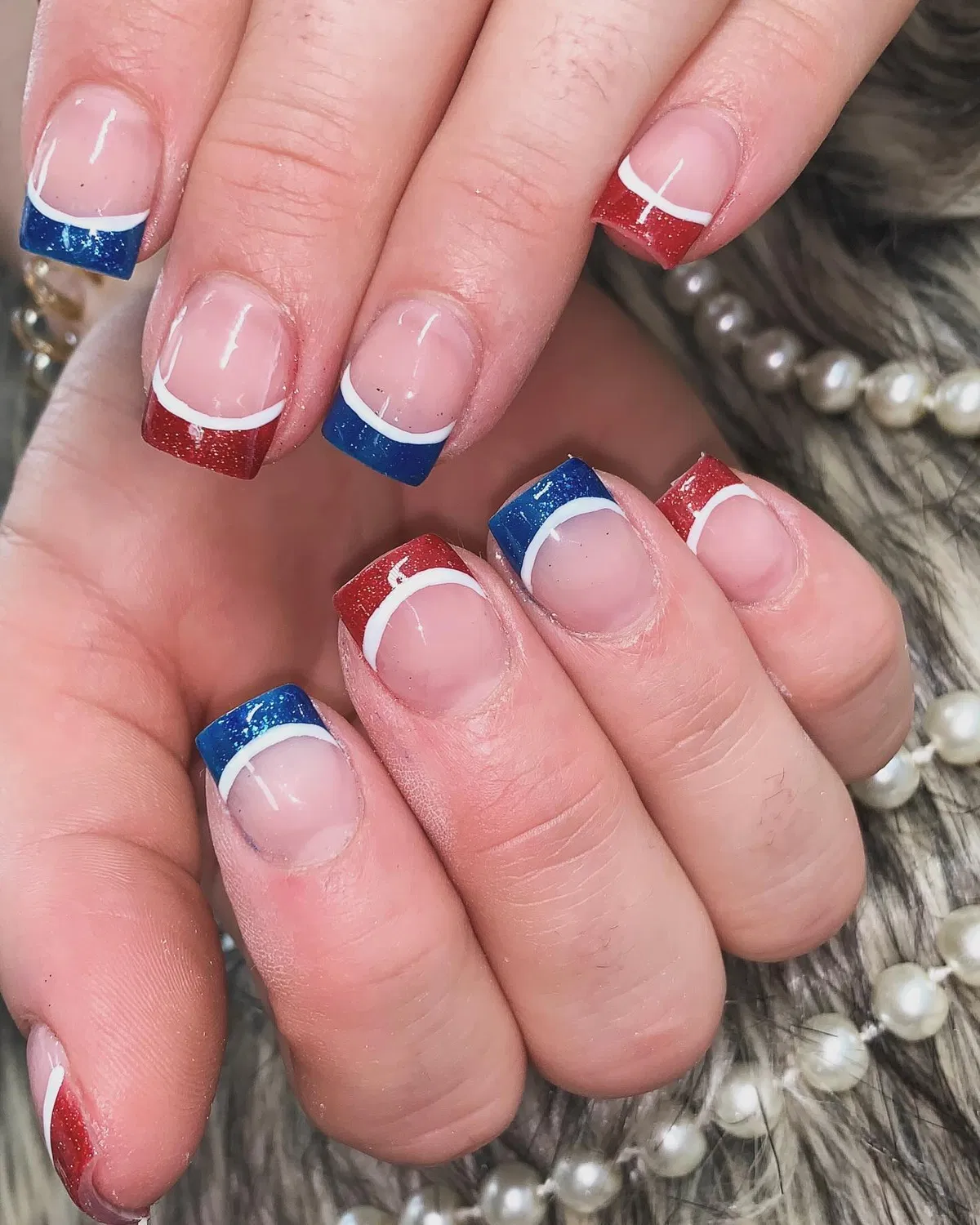 Glitter red and blue French-style tips