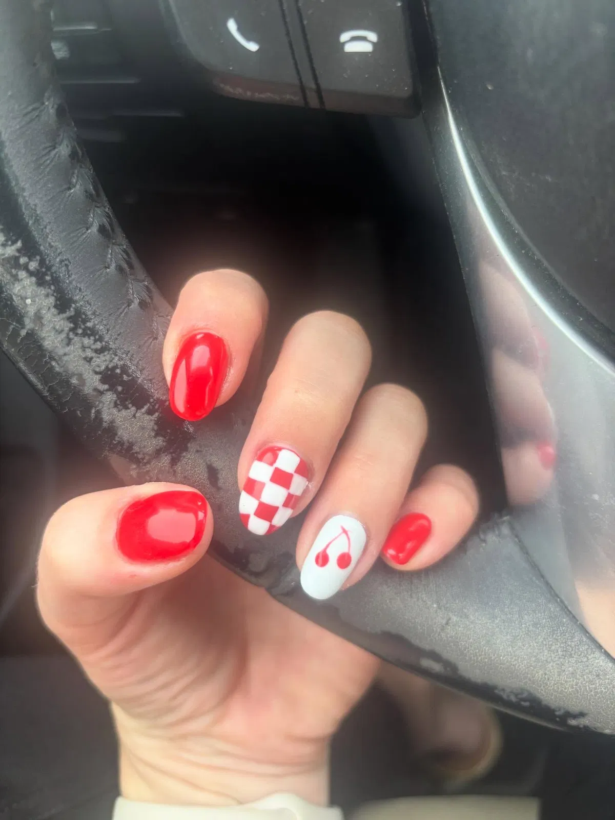 Red nails with red-and-white checkers