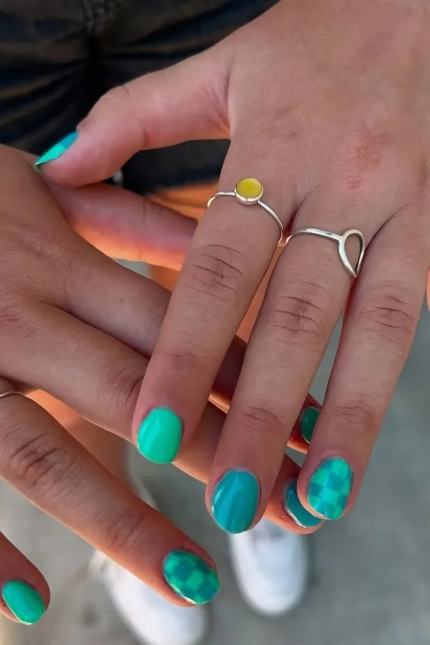 Teal nails with tonal checkered accents