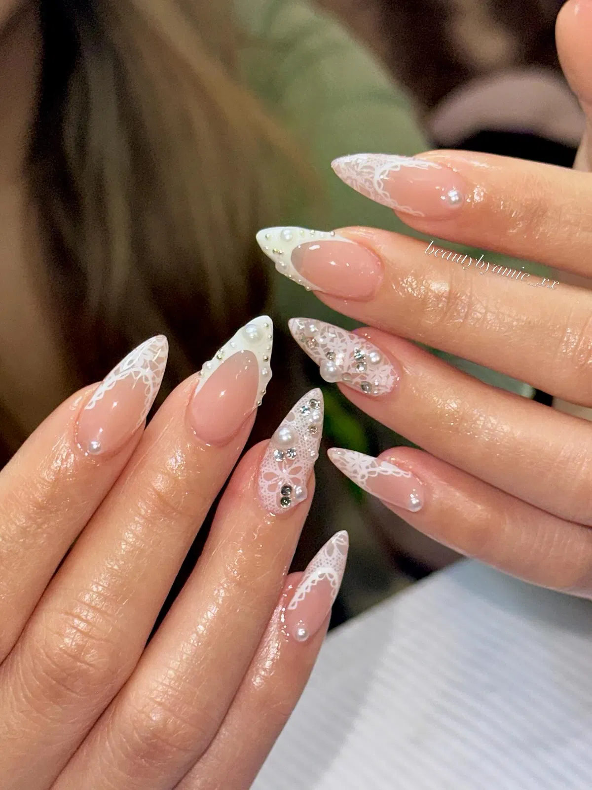 Lace-edged stilettos with pearls and rhinestone accents