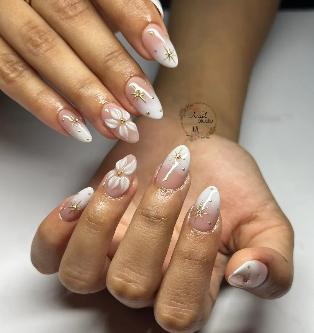 Nude-to-white ombre with gold starburst accents