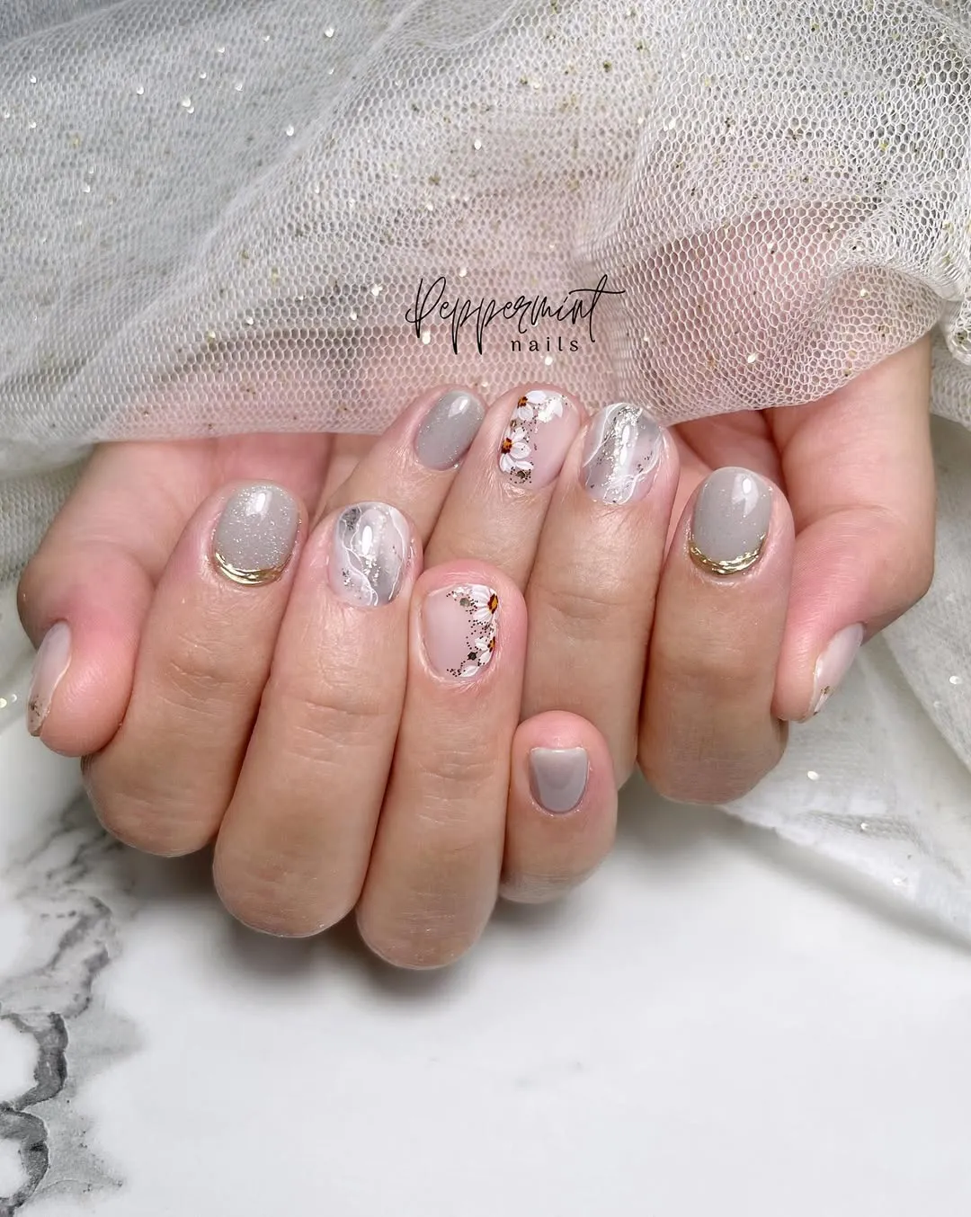 Gray and sheer pink mix with floral accents