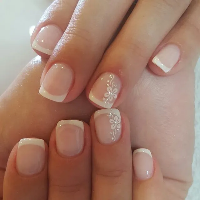 Short square French tips with white floral linework
