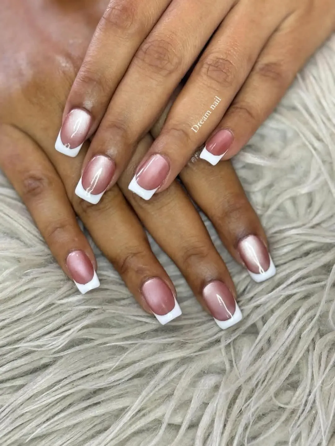 Glossy pink square French tips with minimal rhinestone