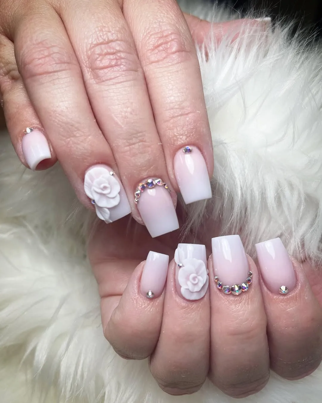 Pink-to-white ombré square nails with 3D roses and rhinestone arc