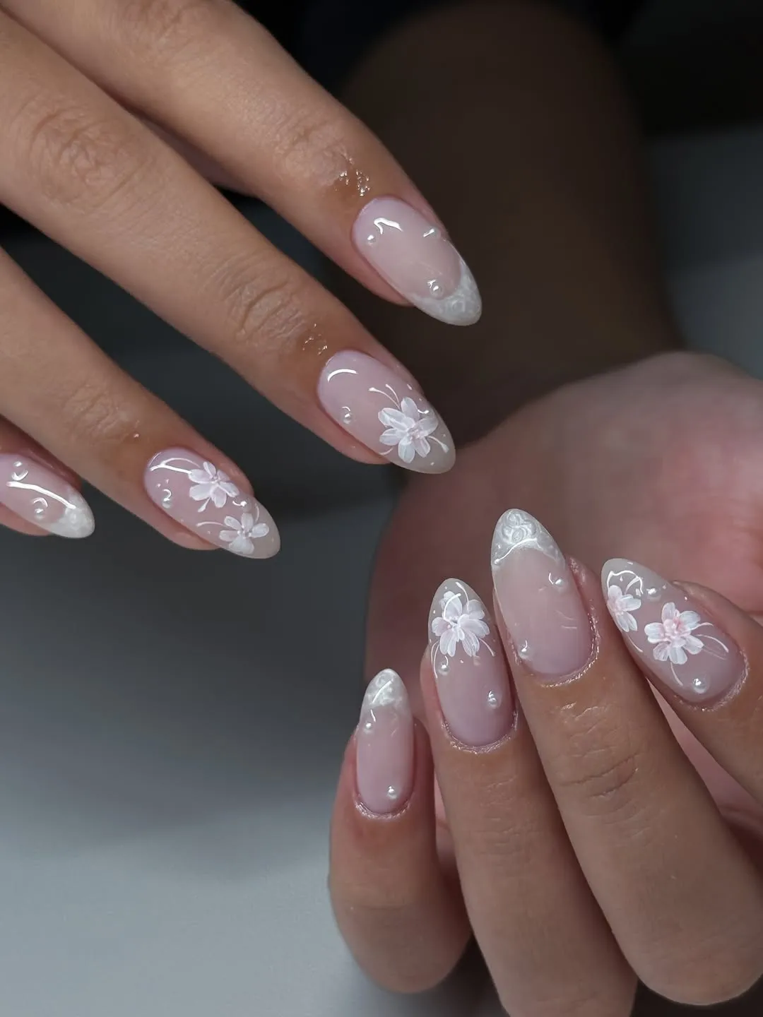 Sheer nude florals with pearly tips and clear droplet accents