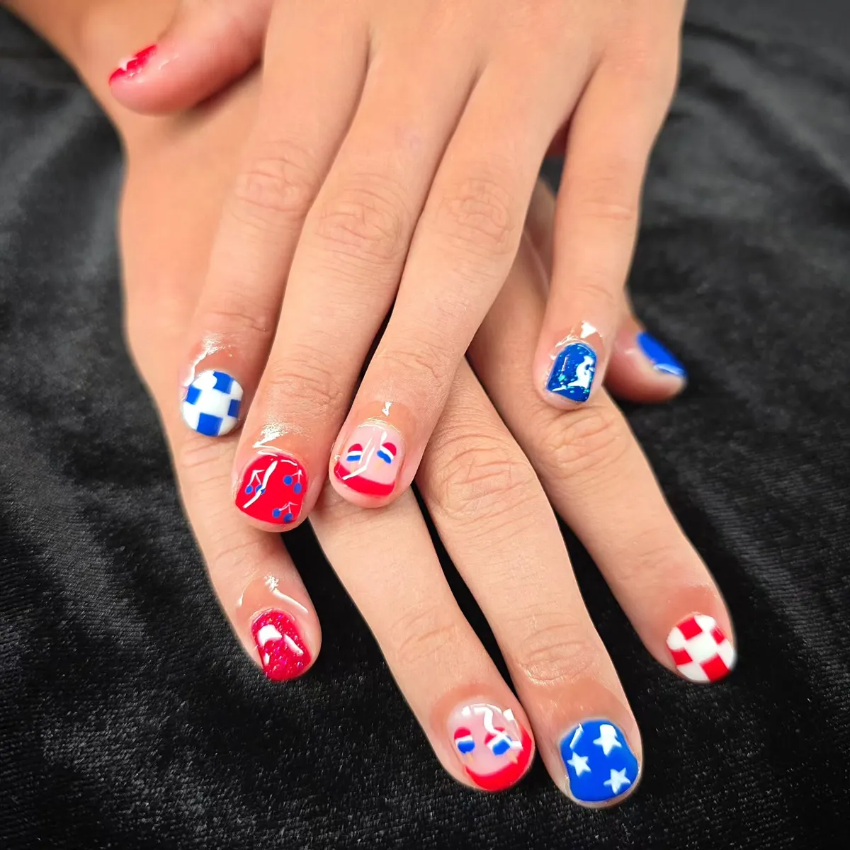 Short mix with music notes, checkers, and star nail