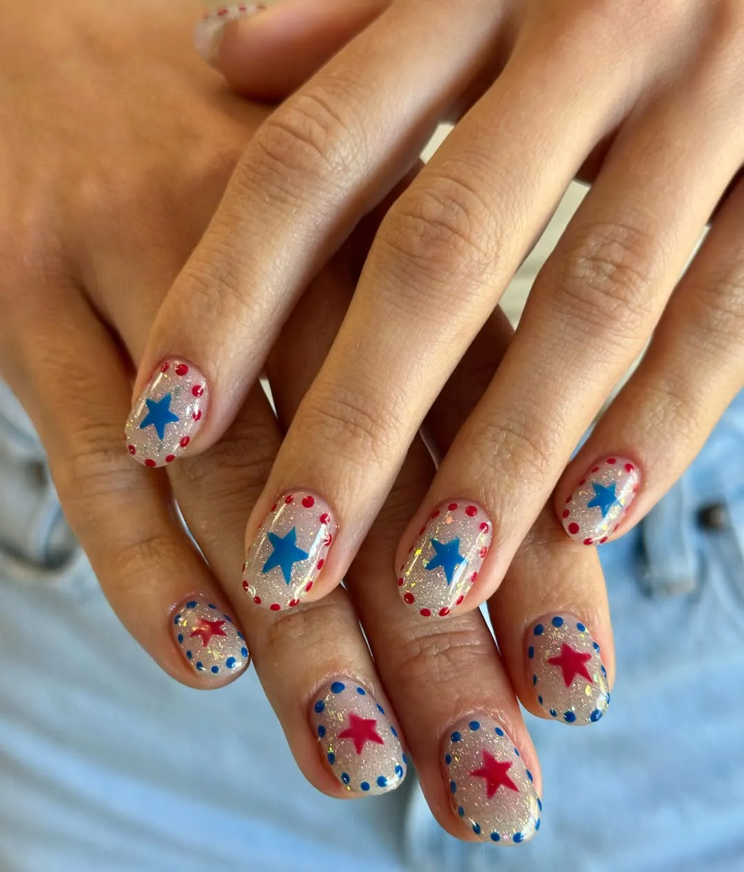 Silver glitter base with centered stars and dotted borders