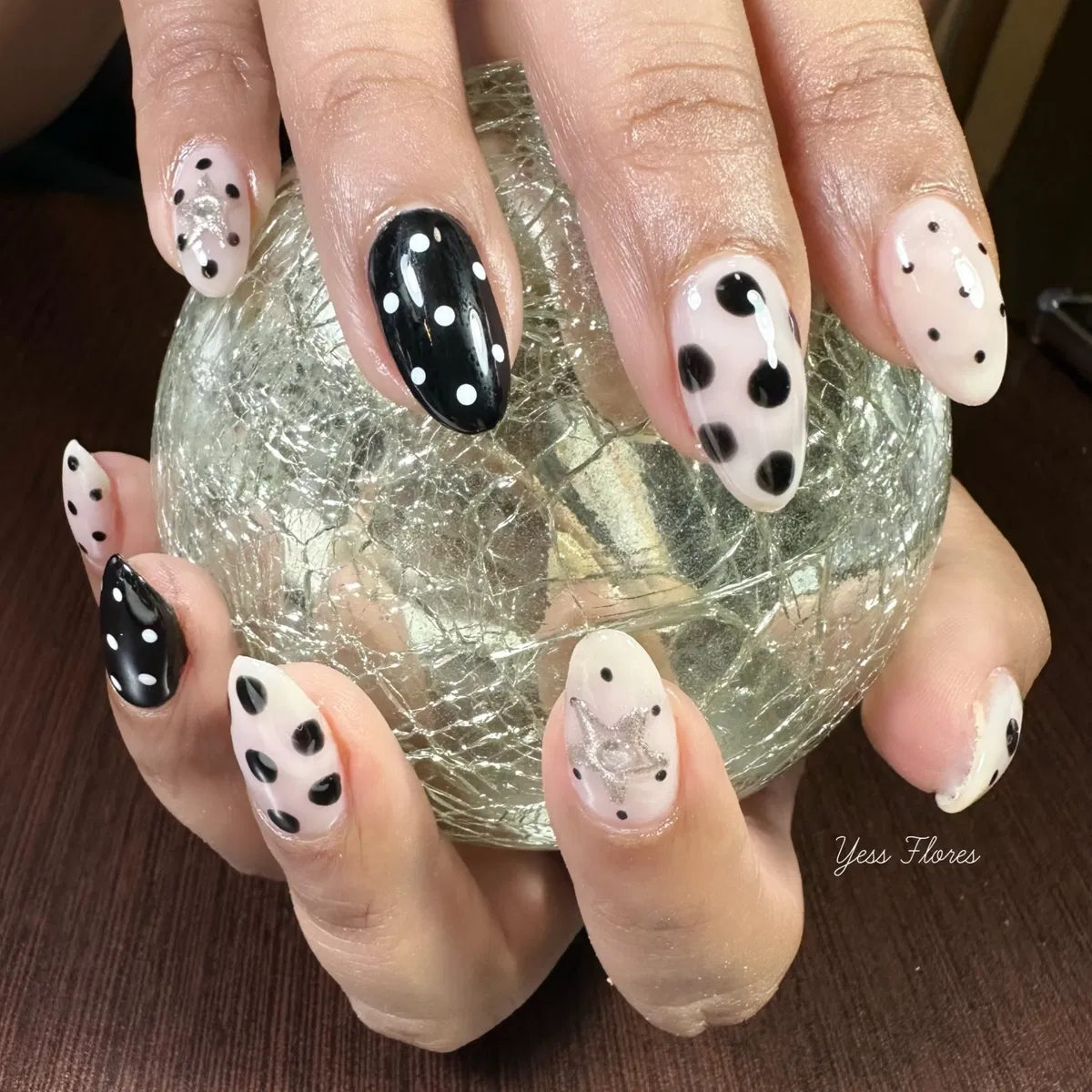 Mixed-scale polka dots with a silver star accent