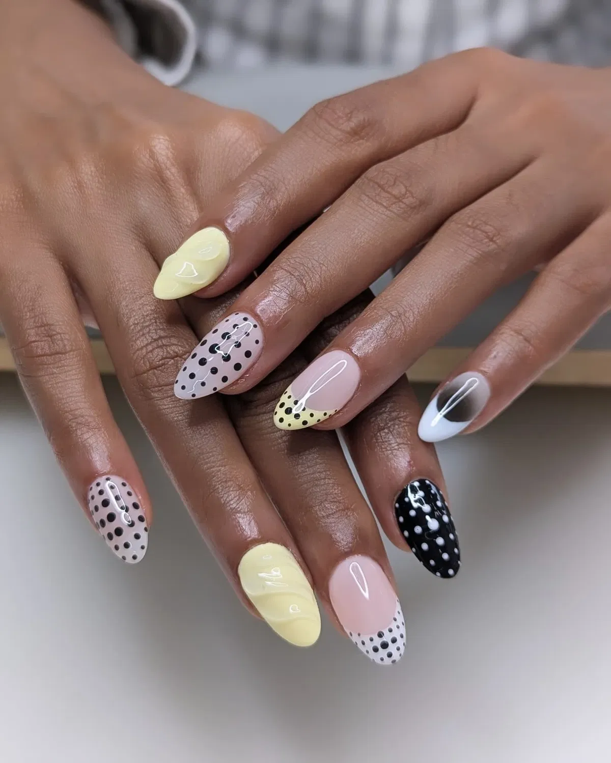Mixed polka-dot set with yellow accents and black-and-white contrast