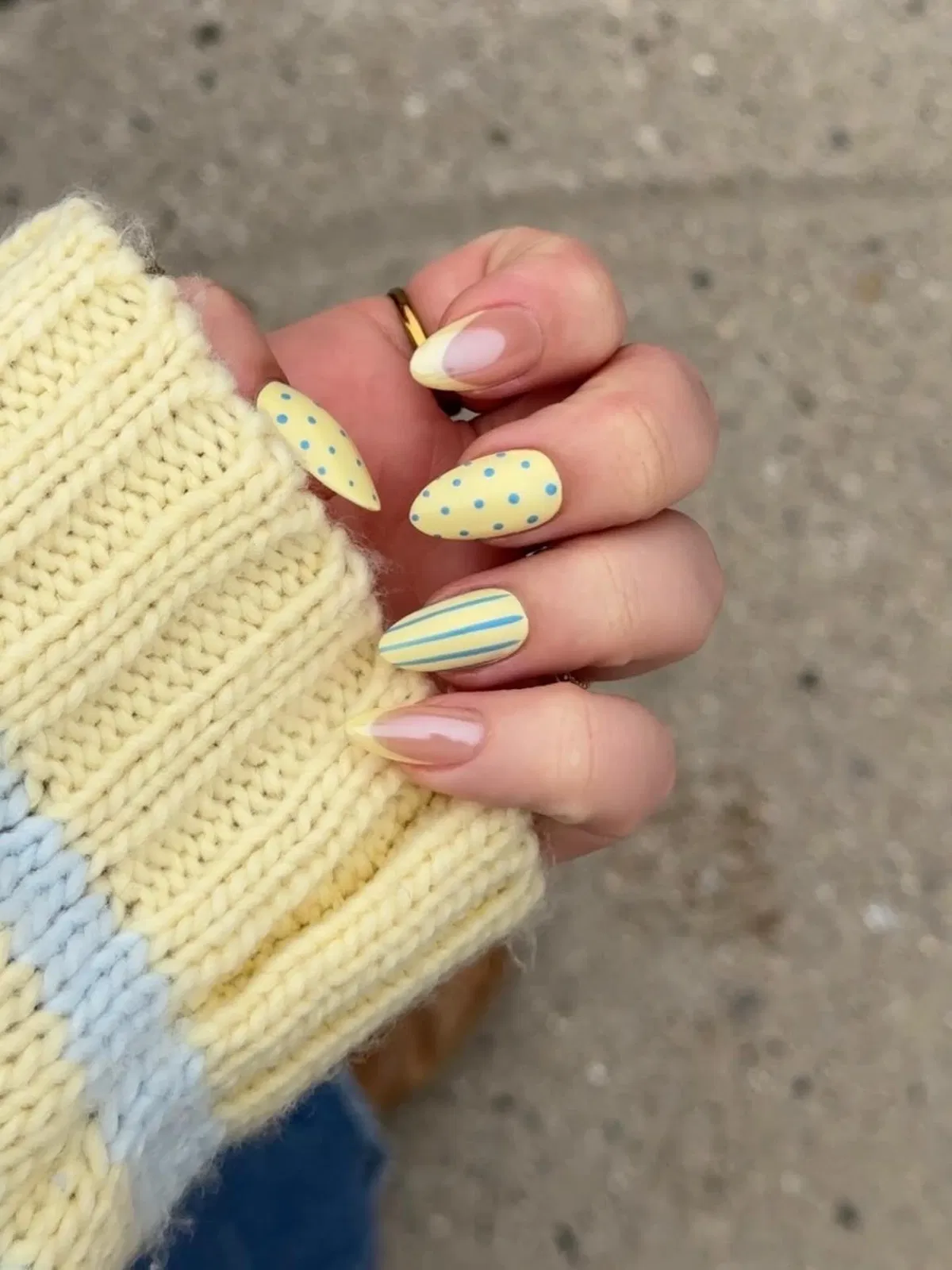 Pale yellow with blue polka dots and striped accent